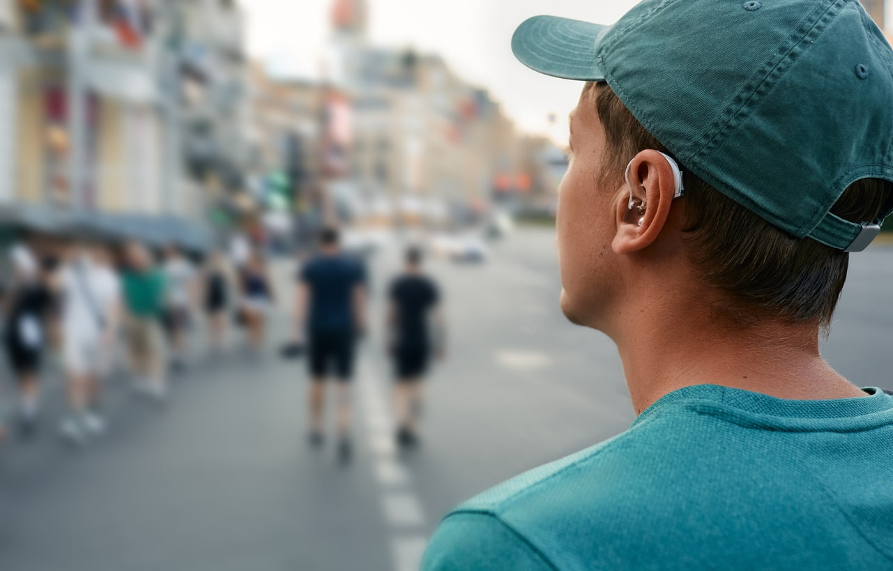 close up of a hearing aid in a man's ear